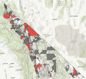 Map of Inyo and Mono Counties - Red layer depicts areas that are eligible for Federal grant programs. Auction 903 and 904 layers are on.